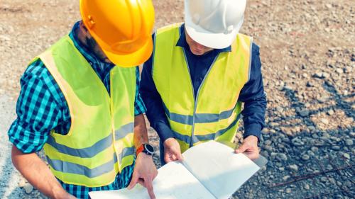 People in hard hats on a construction site
